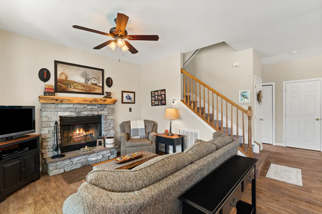 Living room with stone fireplace