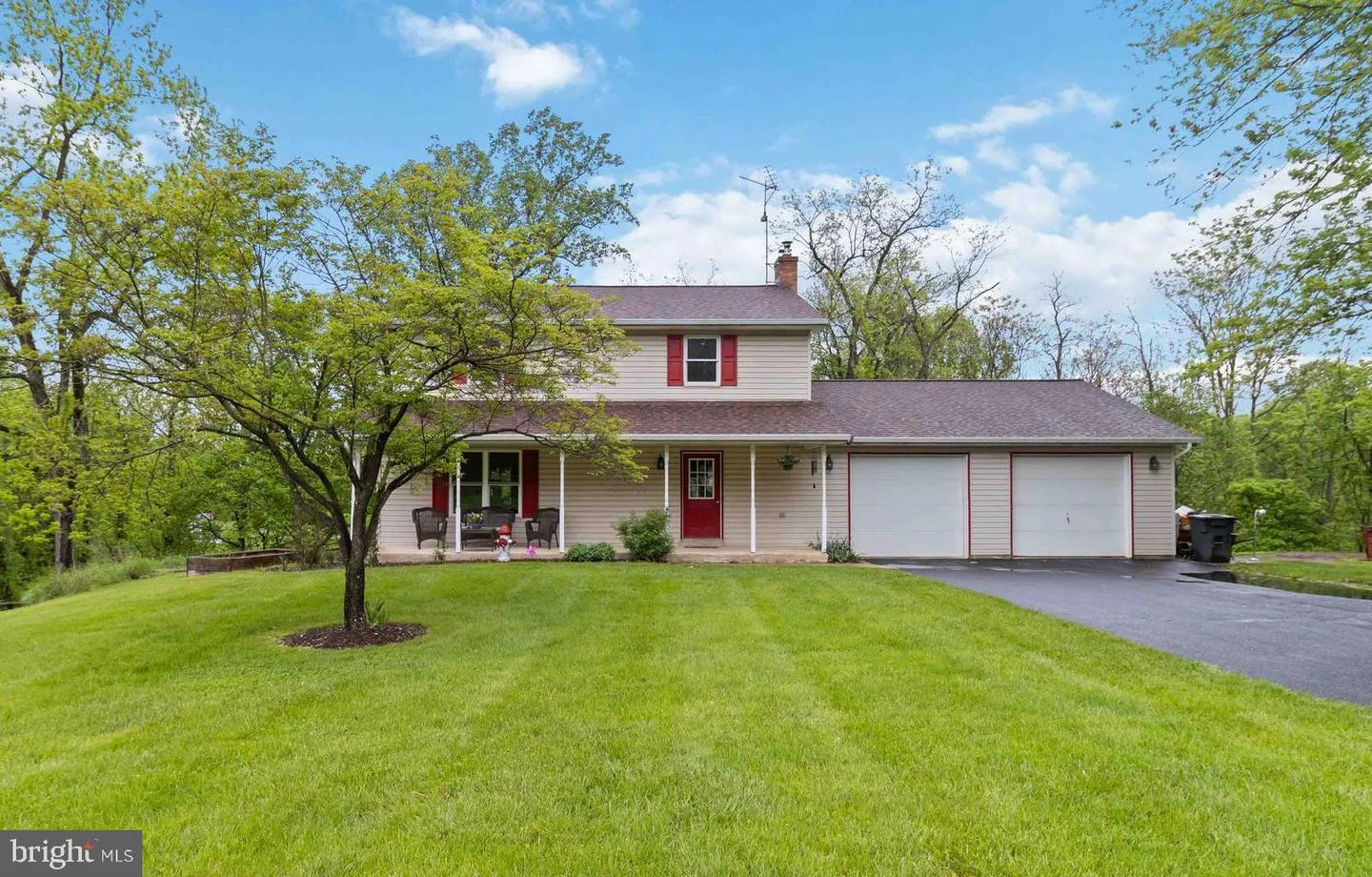 Professional exterior listing photo of a two-story home marketed by Team Sechman