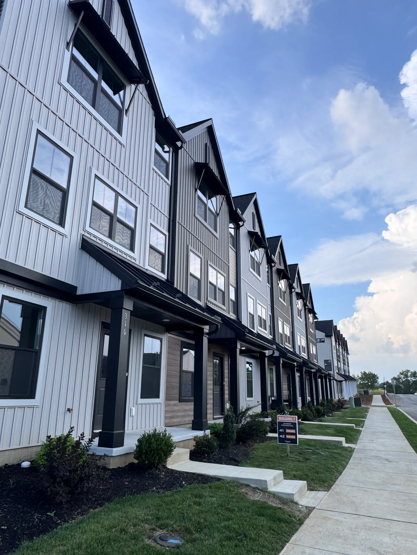 Front entrances and sidewalk at Candler's Pointe townhomes in Annville